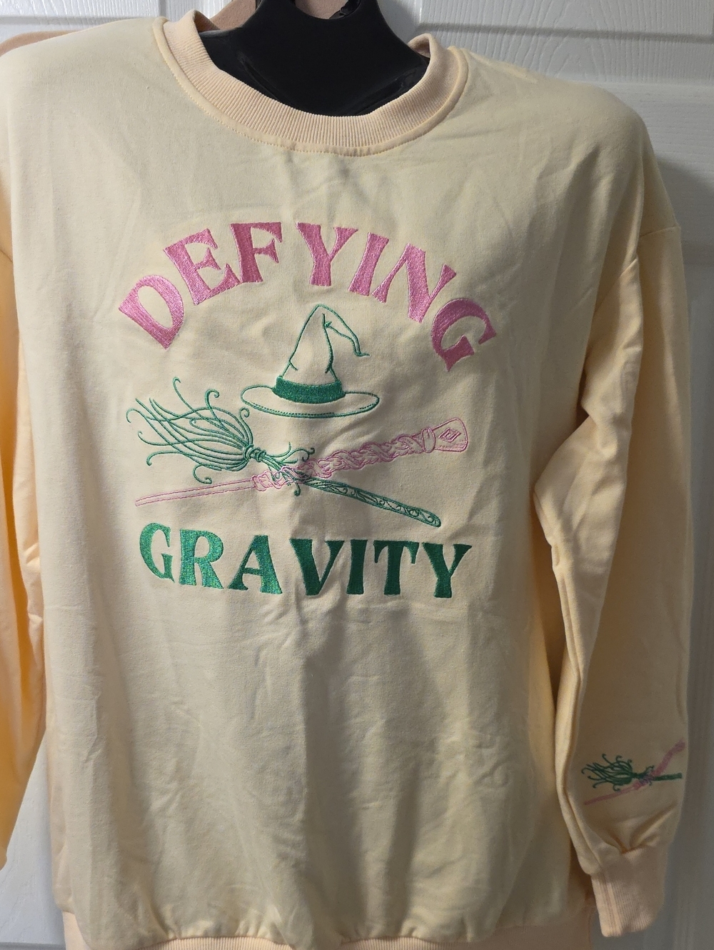 Wicked Defying Gravity Embroidered Sweatshirt - Cream with Pink & Green